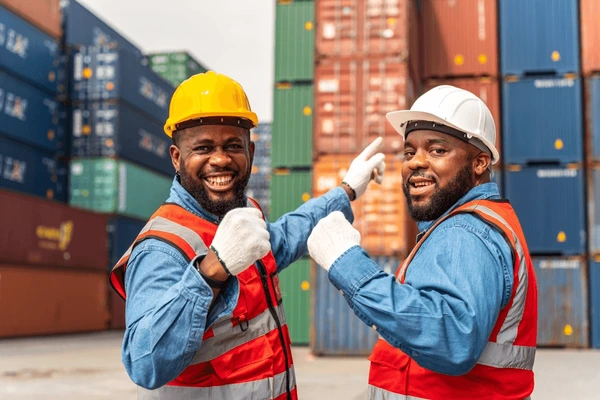 Isfecom Services team discussing logistics planning